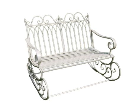 Regency design wrought metal garden rocking bench, scrolled cresting rail flanked by finials, arched design back over strap s