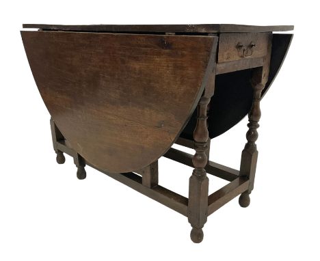 18th century oak drop-leaf dining table, oval top over gate-leg action, fitted with single drawer, raised on turned supports 