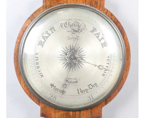 An early Victorian rosewood wheel barometer of oversized proportions with silvered dial, inscribed 'Adie Optician Liverpool',