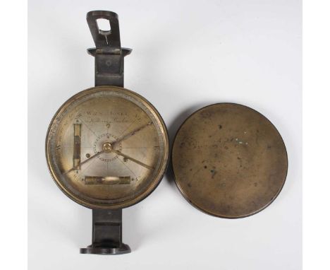A George III brass circular surveyor's compass or miner's dial and cover, the 4½-inch silvered dial signed 'W &amp; S Jones 3