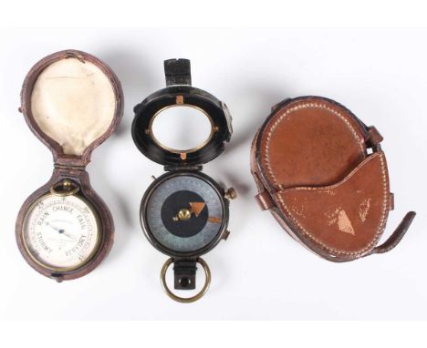 An early 20th century Negretti &amp; Zambra lacquered brass cased pocket barometer, the signed silvered dial numbered '27807'