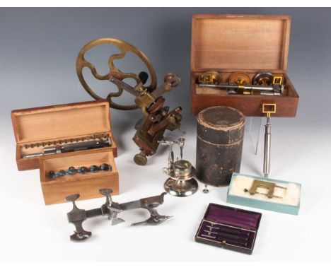 A 19th century brass and steel watchmaker's topping tool lathe, wheel diameter 18.2cm, together with a small collection of ot