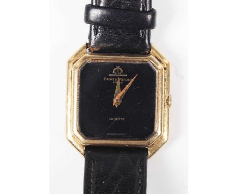 A Baume &amp; Mercier Quartz 18ct gold cut cornered square cased lady’s wristwatch, the signed black dial with tapered gilt h