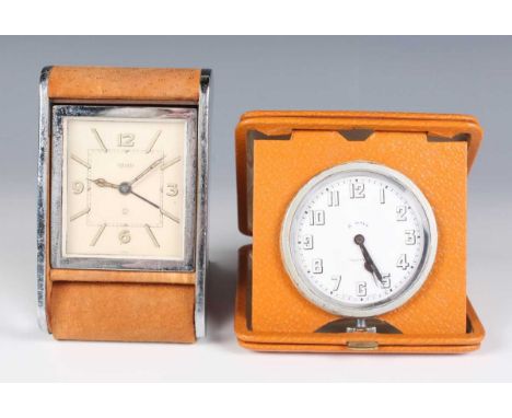 A Jaeger chrome plated and tan suede covered folding bedside travelling alarm clock with two day movement, the signed dial wi