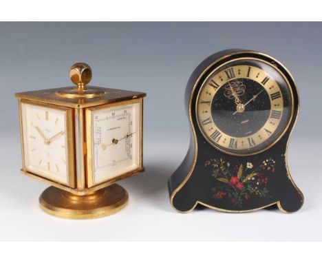 A mid-20th century Imhof gilt brass desk timepiece and weather compendium, the revolving cube shaped case inset with silvered