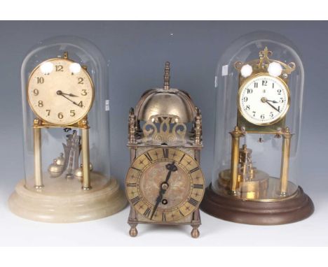 A 20th century brass lantern clock style mantel timepiece, height 24cm, together with a brass Torsion anniversary mantel time