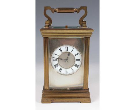 A late 19th century French brass cased carriage clock by Maurice &amp; Co, with eight day movement striking and repeating on 