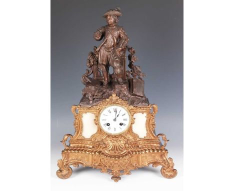 A mid to late 19th century French brown patinated and gilt spelter mantel clock, the eight day movement with silk suspension 