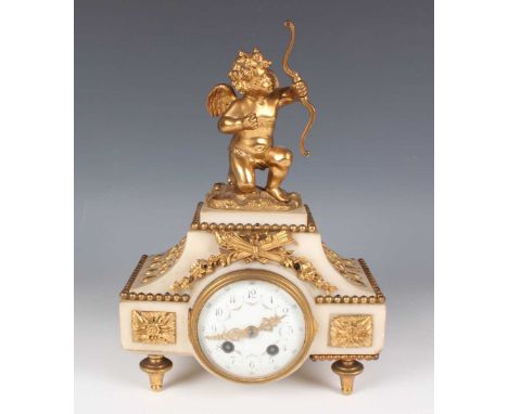 A late 19th century French ormolu and white marble mantel clock, the eight day movement with platform escapement and striking