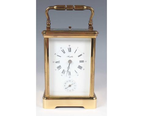 A late 20th century French lacquered brass corniche cased carriage alarm clock by L'Epée, the eight day movement striking hou