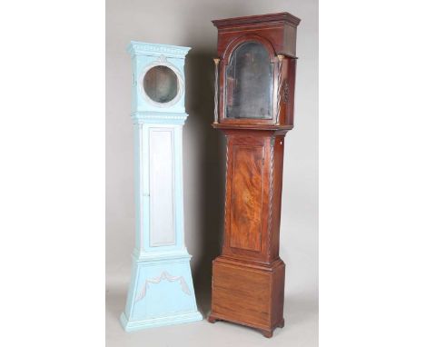 A George III mahogany longcase clock case, the hood with moulded pediment above glazed door and spiral reeded columns, the si