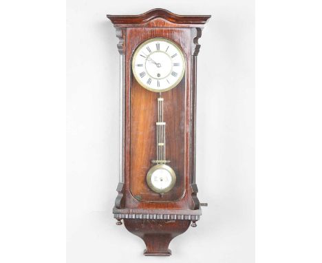 A late 19th century simulated rosewood cased Vienna style wall timepiece with single train movement, the brass supporting fra