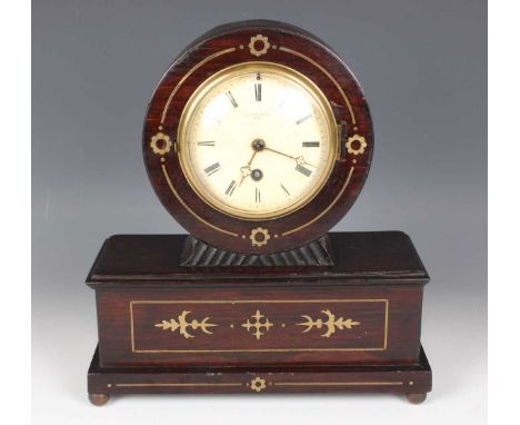 A 19th century rosewood cased mantel timepiece with eight day movement, the backplate stamped 'F.L. Hausburg a Paris', the ci