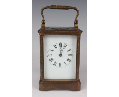 A late 19th/early 20th century French brass cased carriage clock with eight day movement striking on a gong, the backplate st