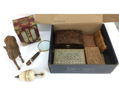 A collection of odds including various boxes and a Victorian light pull