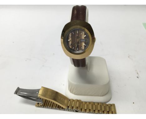 A 1970s Rado diastar ladyâ€™s wristwatch with fully jewelled Movement, day date scratch proof case , In working order. With o