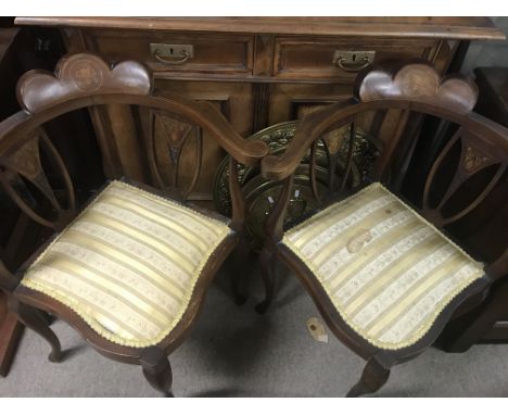 A Edwardian inlaid salon suit, comprising two seater sofa four  corner chairs and two open armchairs