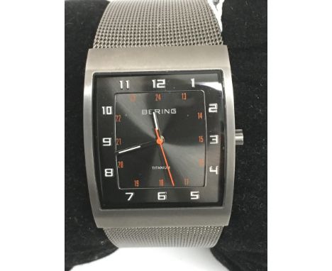 A gent's Bering Titanium wristwatch on woven strap