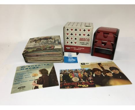 A collection of vinyl singles and an Arrco automatic playing card shuffler, untested.