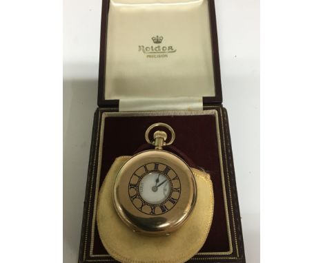 A quality 9carat gold half hunter pocket watch Roidor Precision. Button wind seen working. The reverse with personal inscript