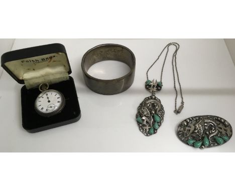 A silver fob watch and bangle plus a Chinese style white metal pendant necklace and brooch set with green stones
