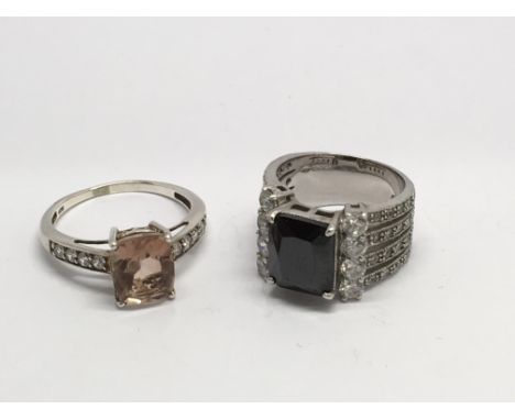 Two 925 dress rings, one set with morganite, the other with central black stone.Approx M and S