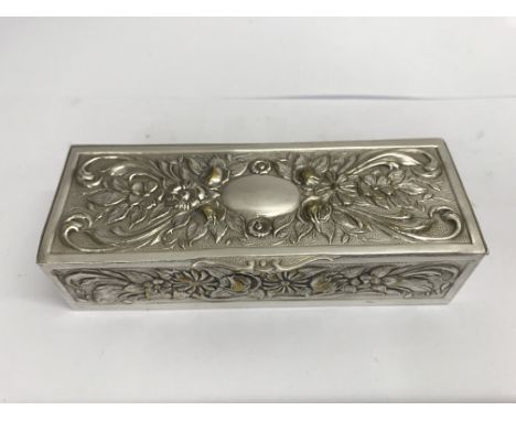 A white metal continental trinket box with foilage design