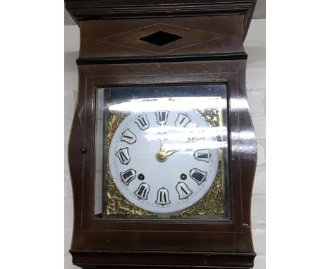 A Quality Swiss Early 19th Century Comtoise clock cirica 1815 with an enamel dial and large visible brass pendulum.