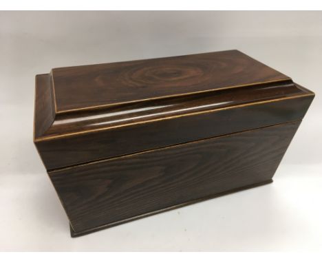 An inlaid oak tea caddy with mixing bowl and interior compartments all intact.