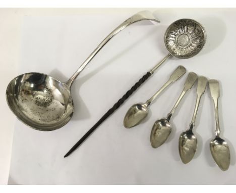Four London silver Georgian teaspoons, an unmarked, white metal punch bowl ladle set with a George II sixpence and a plated e