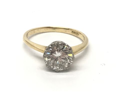 An 18ct gold mounted diamond solitaire ring approximately 1.70ct, colour grade G/H, clarity SI2. Ring size M, together with I