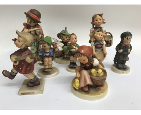 A collection of 9 Hummel figures