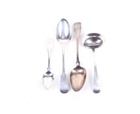 A George III Irish silver fiddle pattern sauce ladle and three spoons, all engraved with crests. Comprising; a sauce ladle, m