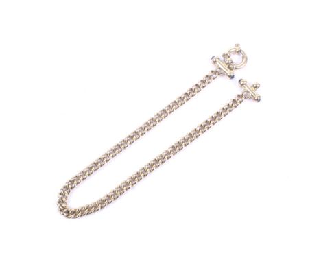 A vintage 9ct gold curb link bracelet. With two cylindrical bars each with small round cabochon sapphire terminals, on a bolt