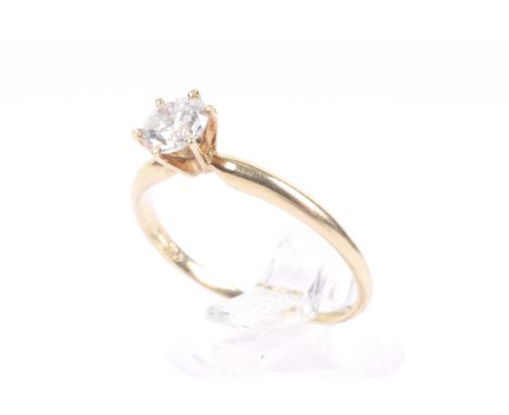 A vintage diamond solitaire ring. The round brilliant approx. 0.56cts, in a six-claw tiffany type setting on a D-section shan