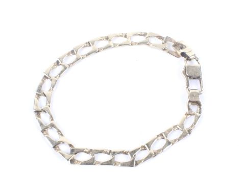 A vintage fancy block link bracelet. On a rectangular trigger clasp, indistinct mark, 19cm long (7 1/2 inches), 9.2g