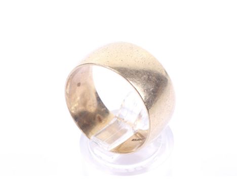 A vintage 9ct gold broad flat-section wedding band. Hallmarks for London 1973, 9.5mm wide, size leading-edge R, 5.8g