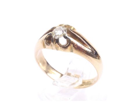 An early 20th century 18ct rose gold and diamond solitaire gypsy ring. The old-cut stone approx. 0.32cts, claw set on a taper