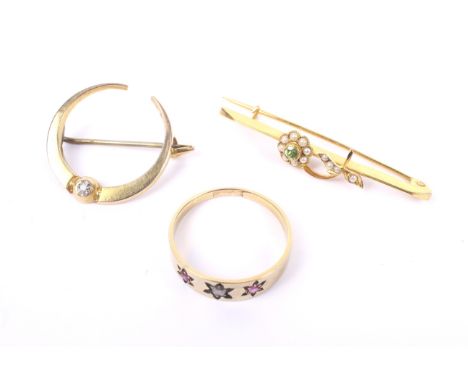 Three Victorian and later gold and gem set jewels including a ruby and diamond three stone gypsy ring. The tapering flat-sect