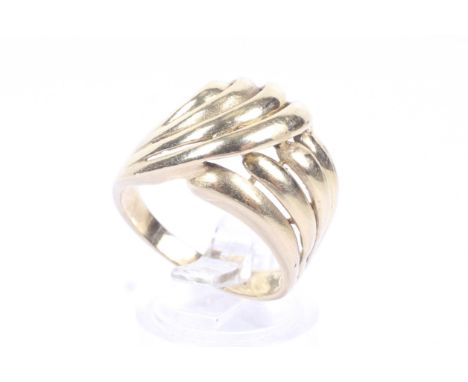 A vintage yellow metal open-scroll cross-over ring. Stamped '14K', size Q, 3.8g gross