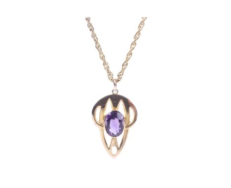 An Edwardian gold and amethyst pendant on a modern chain