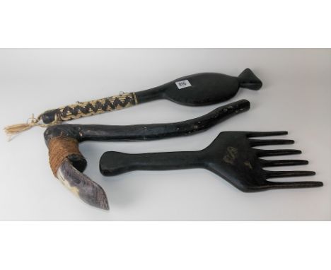 Three tribal African wooden tools.