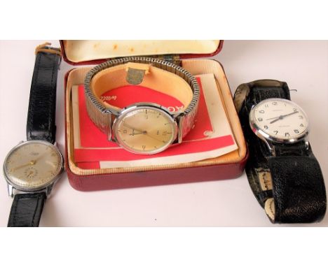 A gents steel cased Saga electric wristwatch upon expanding bracelet within original box with papers; together with an Ingers