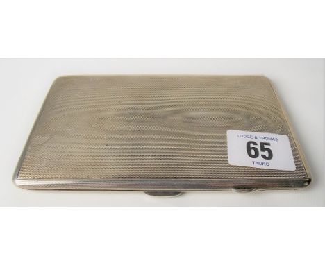 George VI silver engine turned cigarette case by Dunhill, London, the interior with engraved dedication dated 1946, width 14c