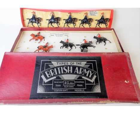 Six W. Britain horse guard figures with Winter cloaks, re-painted, together with a collection of five Dragoons within a Types