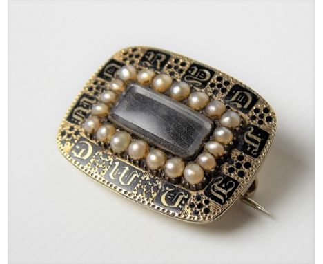 19th Century gold and black enamel seed pearl set mourning rectangular brooch with glazed hair panel surrounded by seed pearl