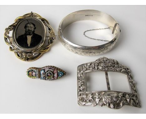 Victorian silver gilt swivel mourning brooch with ambro type portrait of a bearded gentleman; together with a foliate cast sh