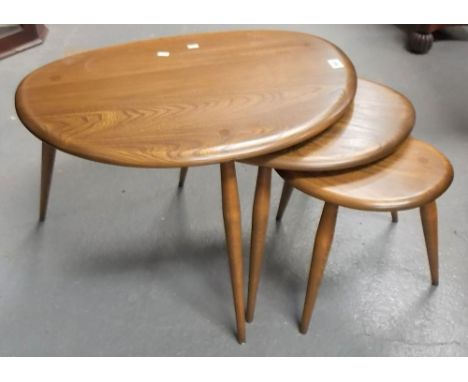 Ercol elm pebble nest of three tables