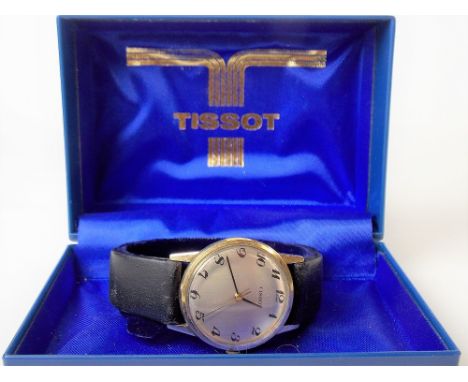 Tissot gents yellow metal cased manual wind wristwatch, the silvered brushed 28mm dial with Arabic Numerals, with original bo