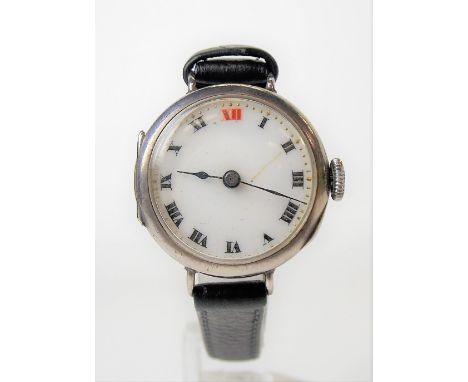 Early 20th Century silver lug wristwatch with 20mm white enamel dial with Roman Numerals &amp; with fifteen jewel movement, h